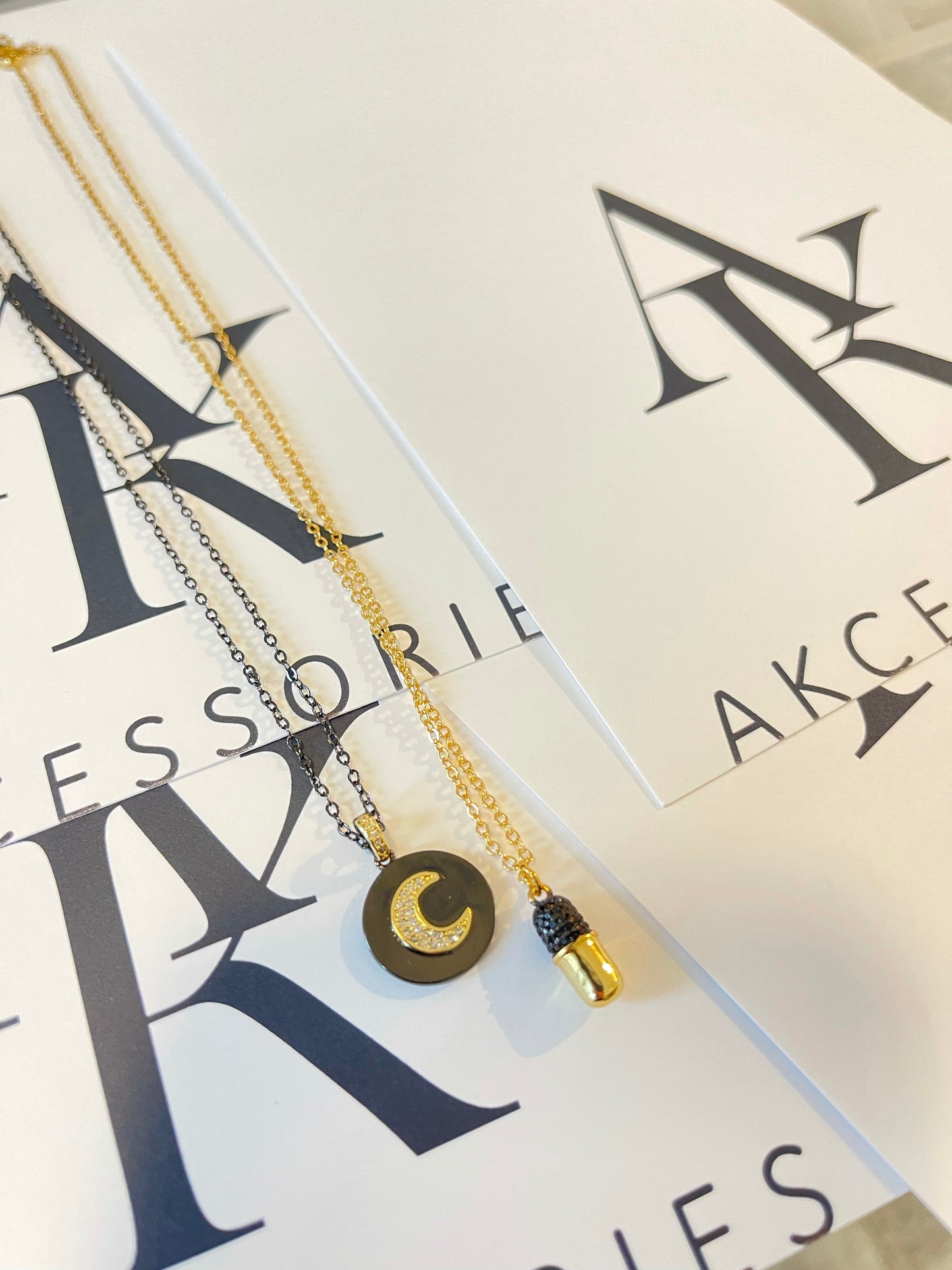 Black Disc Gold Charm Necklace